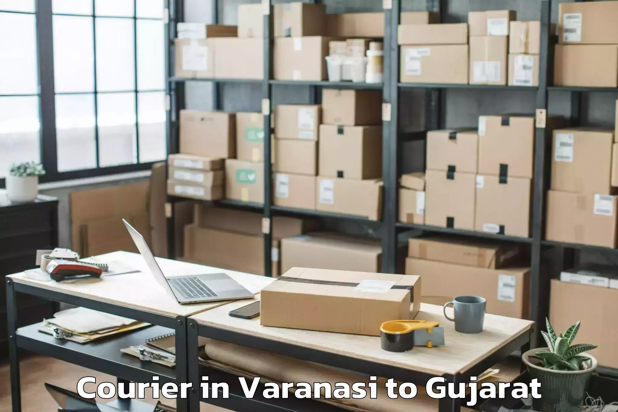 Book Varanasi to Vaghodia Ina Courier Online